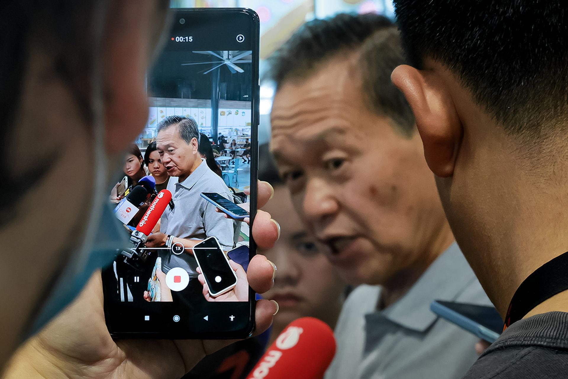 Mr Tan speaking to the media during his visit to Senja Hawker Centre on Aug 24, 2023. ST PHOTO: GAVIN FOO
