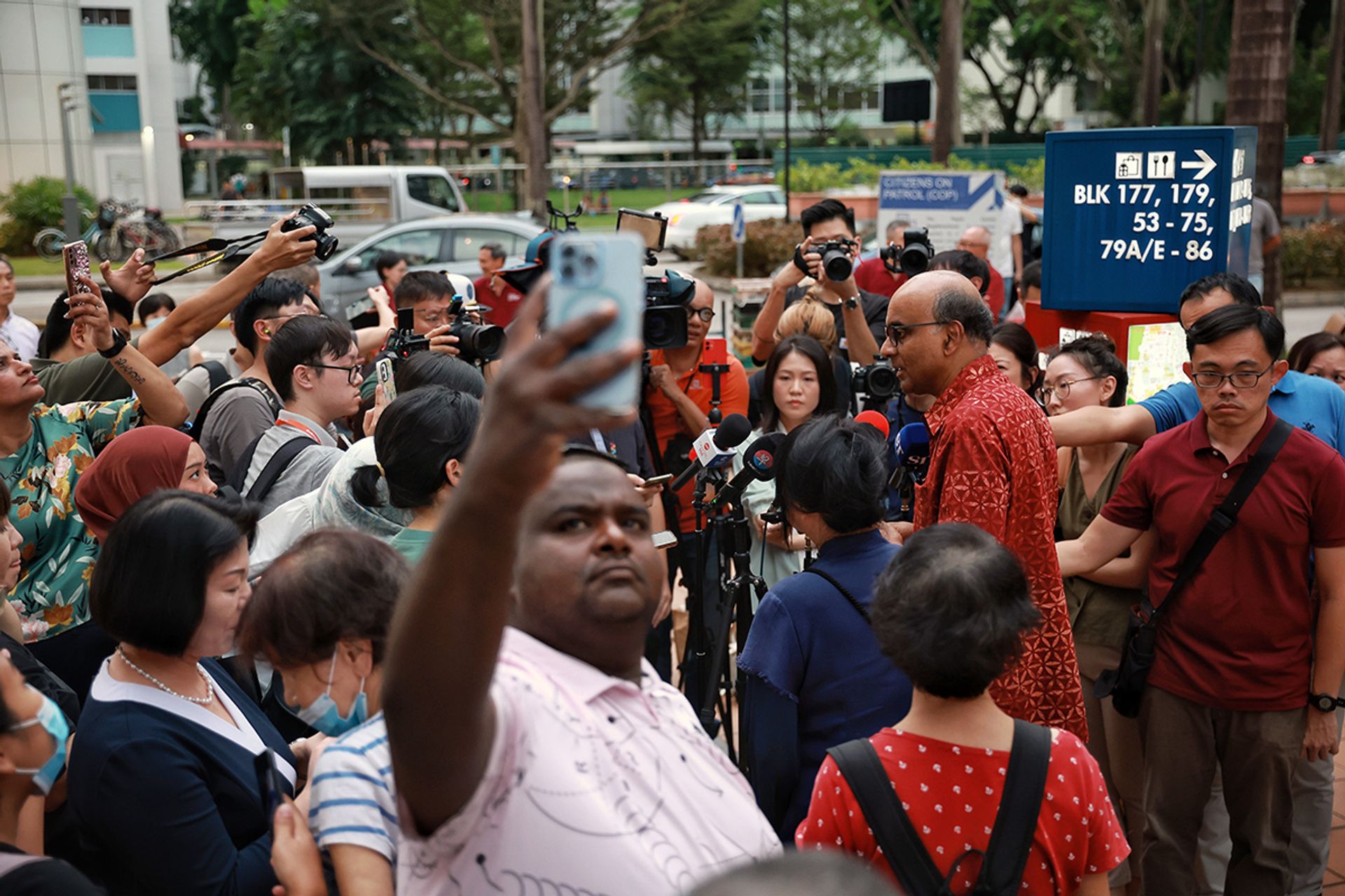 Mr Tharman and his wife speaking to the media during a visit to Toa Payoh Central on Aug 23, 2023. ST PHOTO: KEVIN LIM
