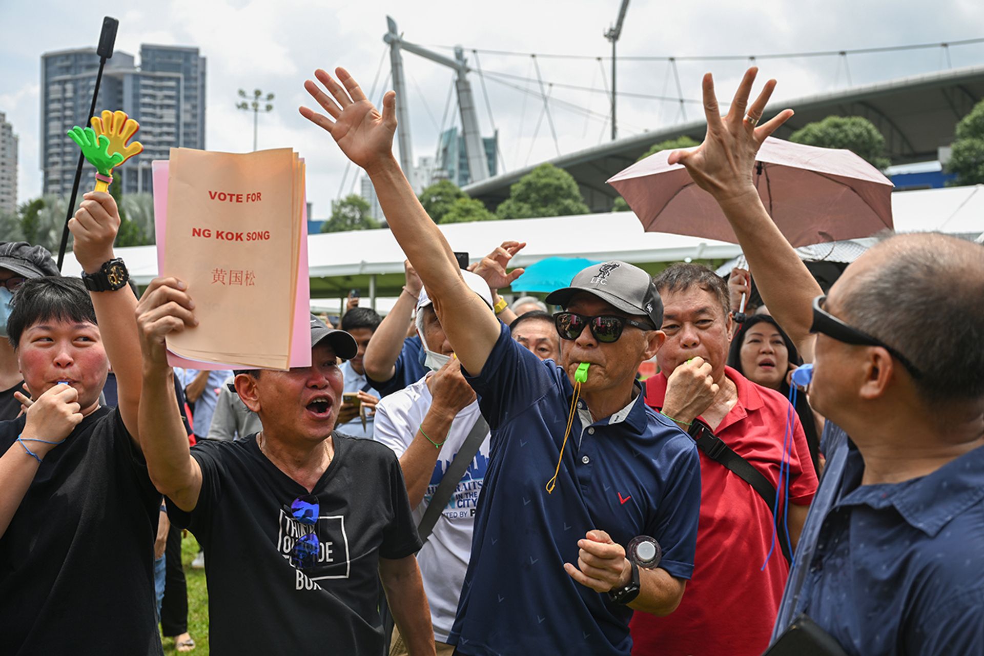 Presidential candidate Ng Kok Song’s supporters cheering as he makes a speech on Nomination Day at the nomination centre at the People’s Association headquarters in Jalan Besar on Aug 22, 2023. ST PHOTO: SHINTARO TAY