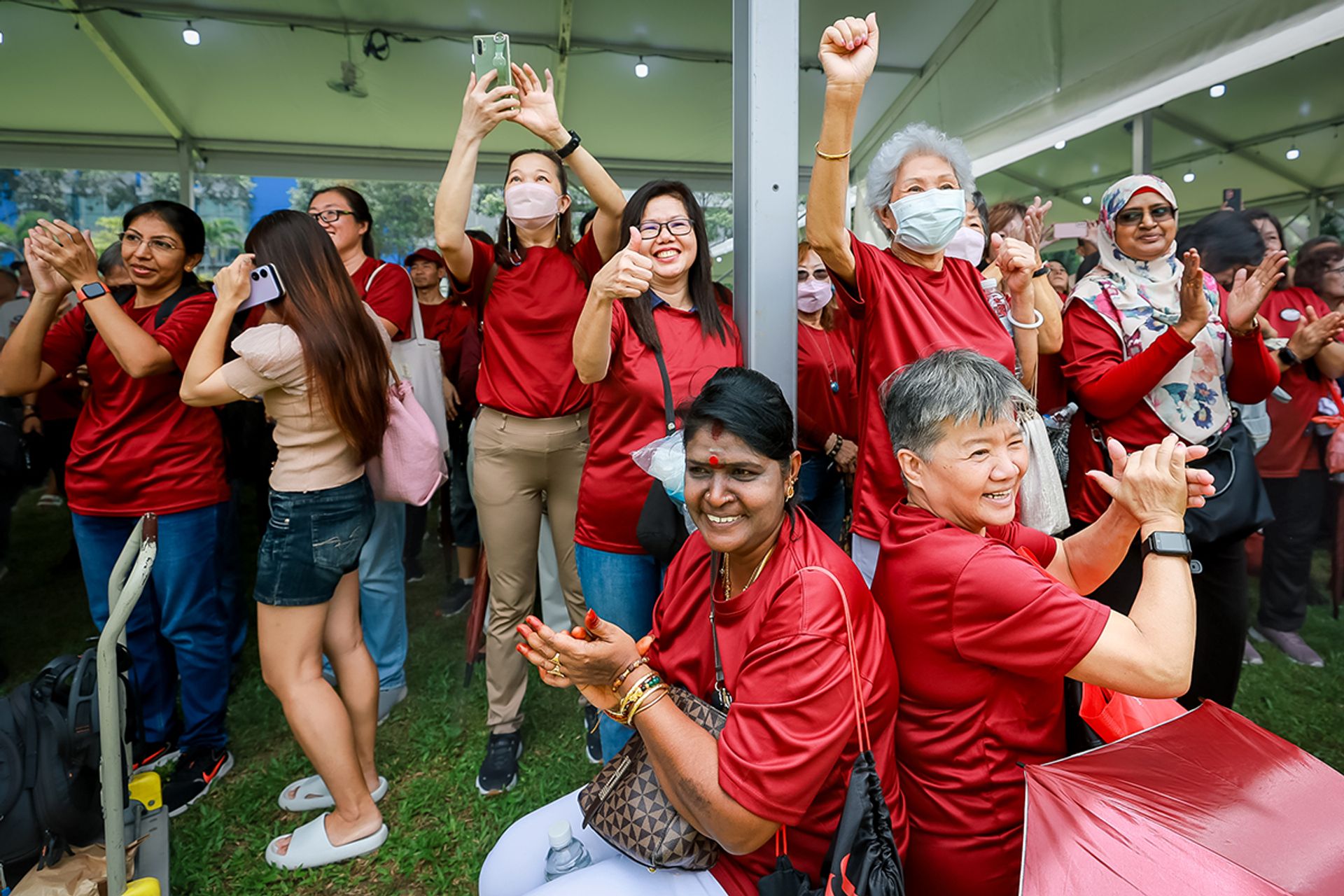 Supporters of Presidential candidate Tharman Shanmugaratnam cheering for him at the nomination centre on Aug 22, 2023. ST PHOTO: GAVIN FOO