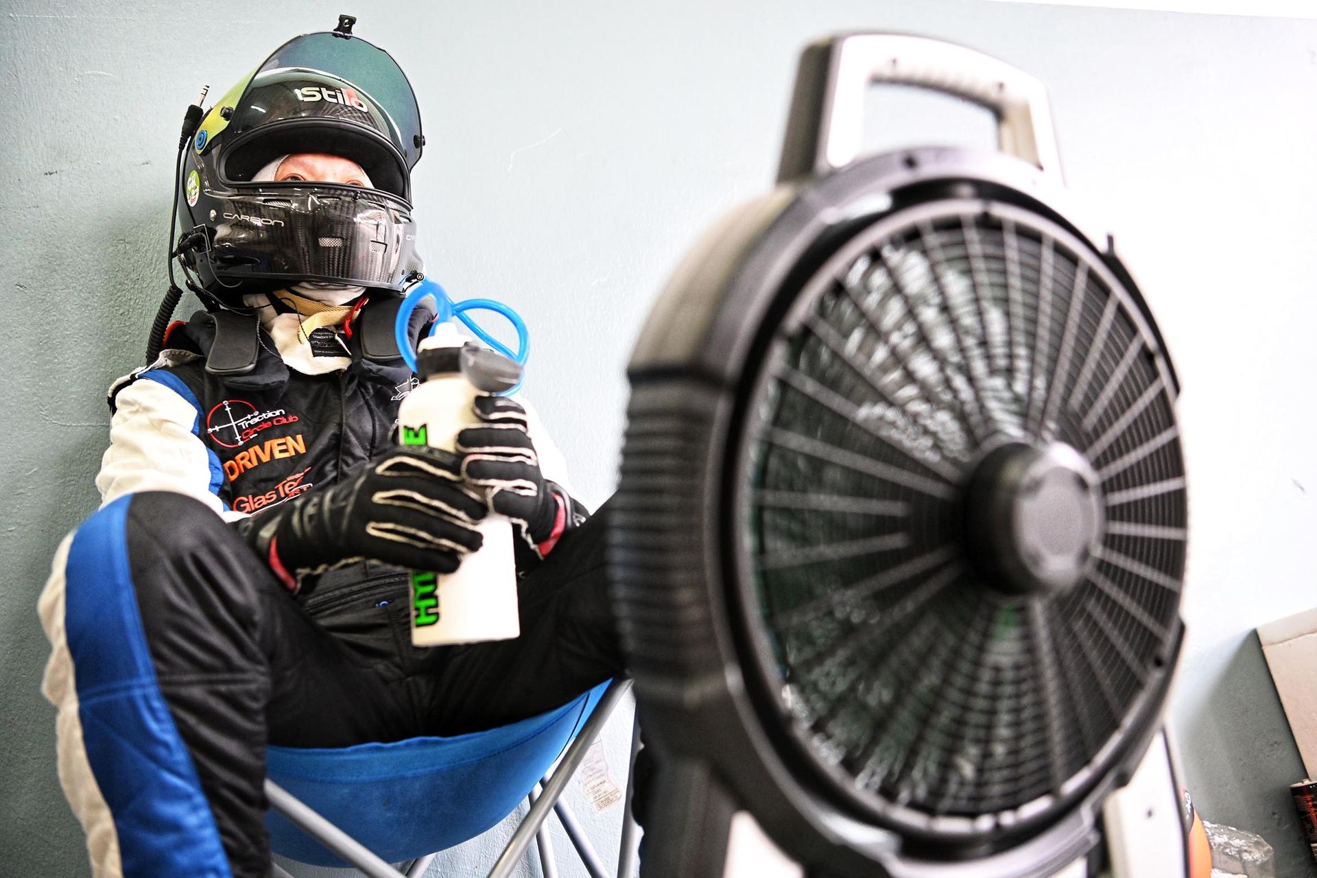Mr Jonathan Teong, a driver from Team 667, tries to stay cool while waiting to take the wheel.